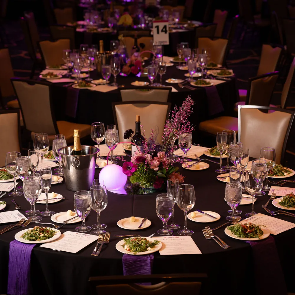 Round banquet table set for a formal awards dinner