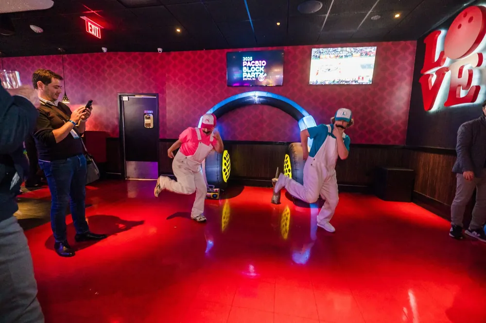 Mario and Luigi performers dancing at PacBio Block Party