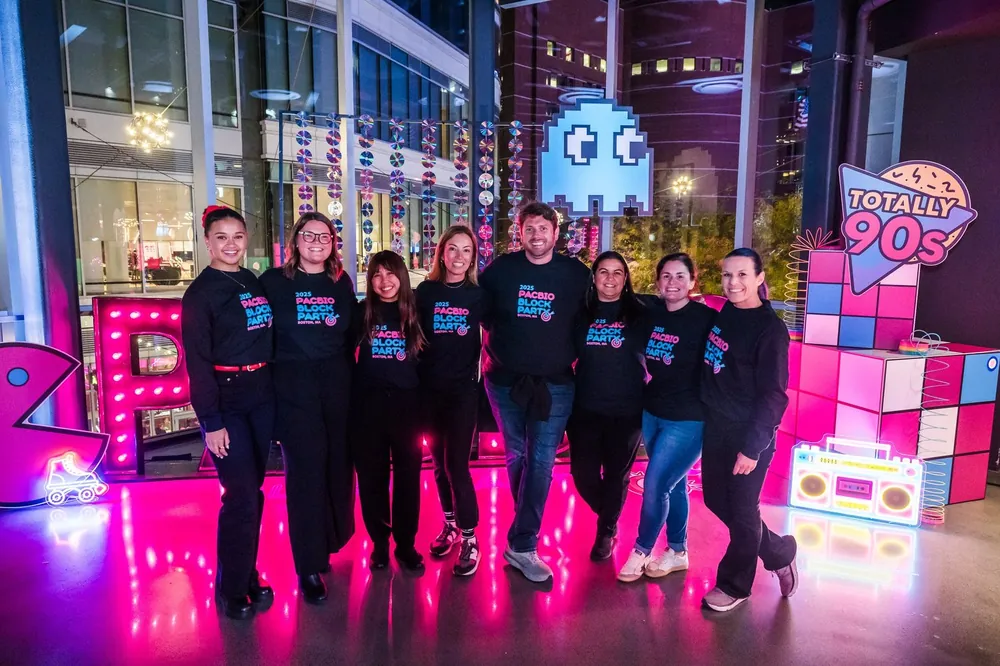 PacBio Block Party team shot under pink lighting