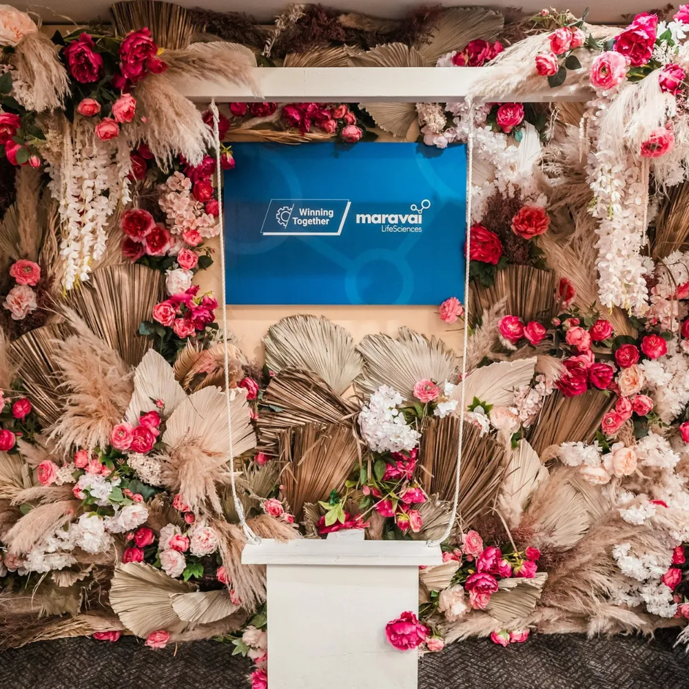 Maravai Winning Together flower wall with pink and beige florals