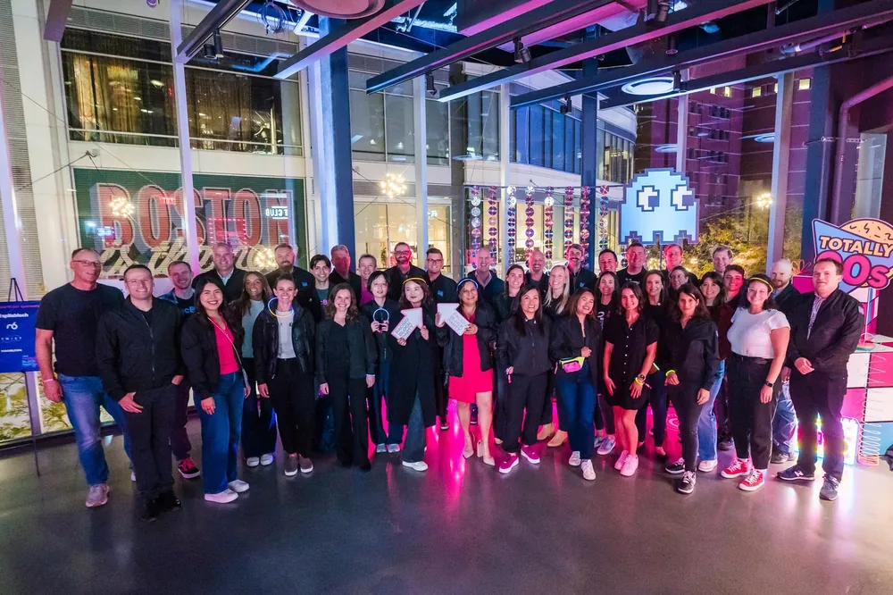 Group at PacBio Block Party with Pac-Man 90s decor